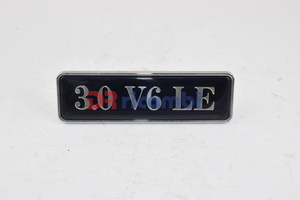 [DR0551] LOGO FREGIO SIGLA MODELLO LANCIA &quot; 3.0 V6 LE &quot; DR0551